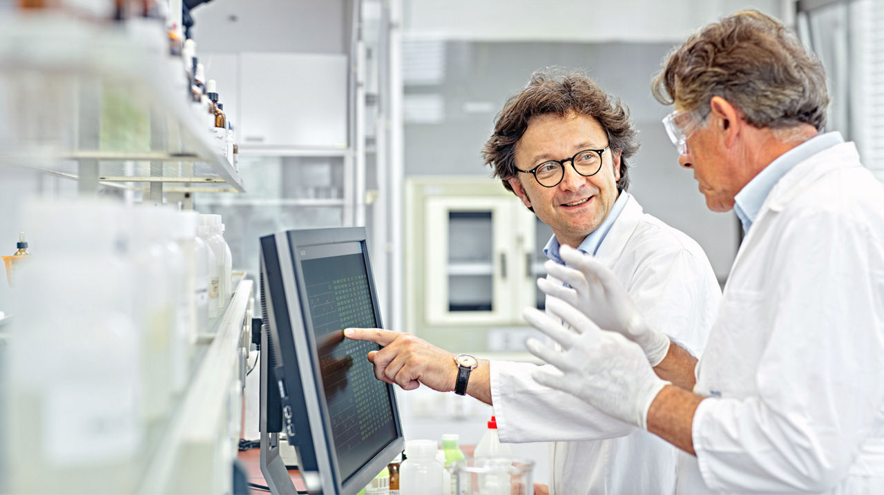 Two scientists working on a project in their laboratory