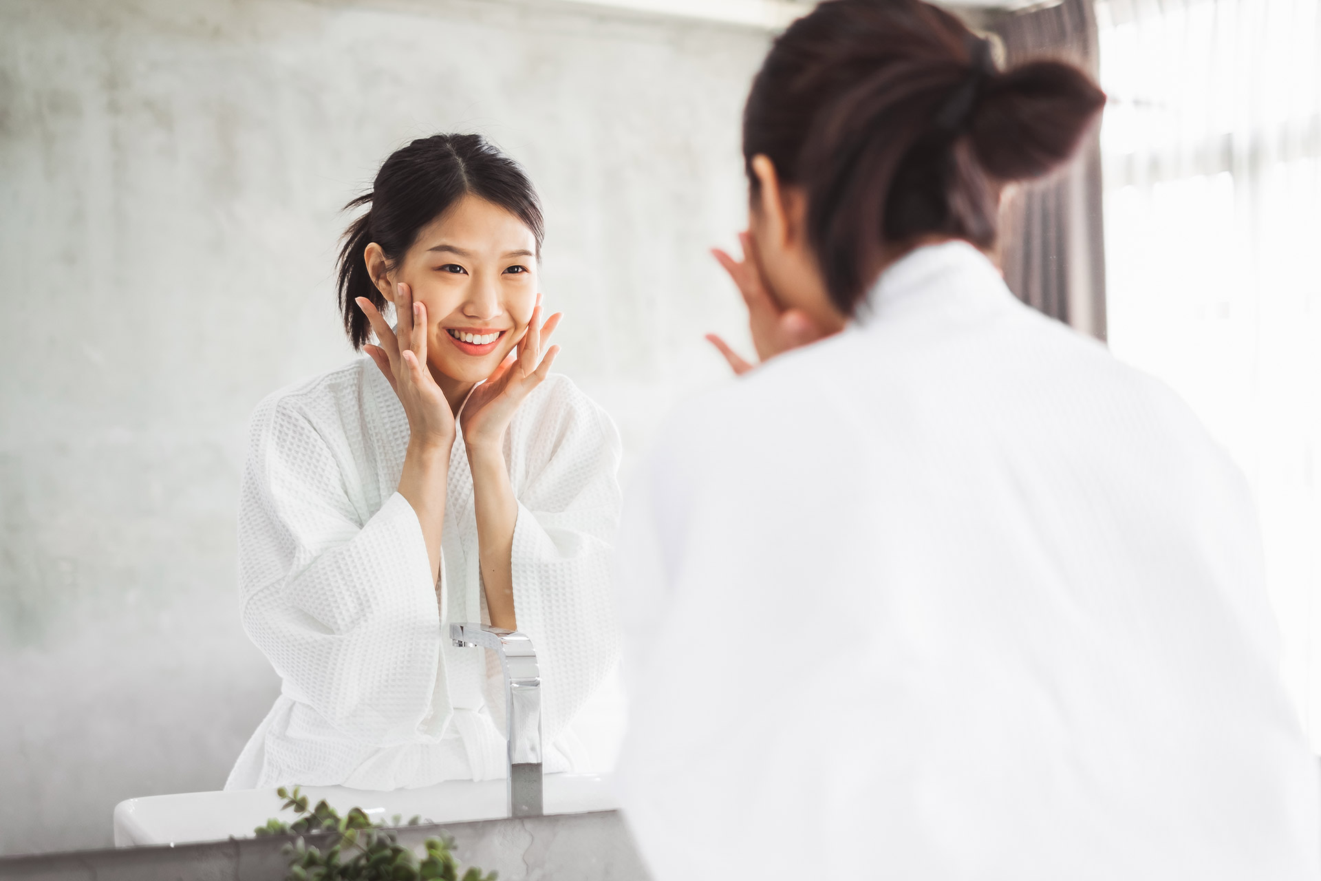 li-woman-checking-reflection-