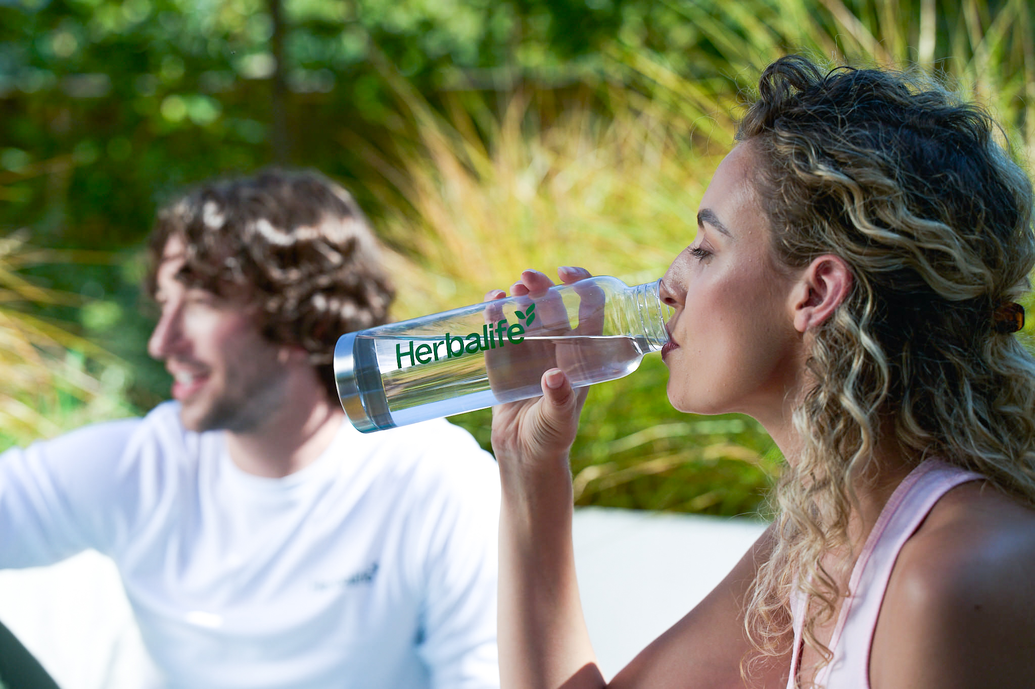 li-woman-drinking-water-bottle