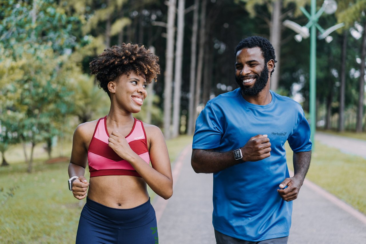Man and woman running in the park