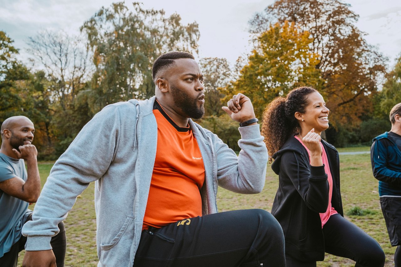 Group of people exercising outdoors