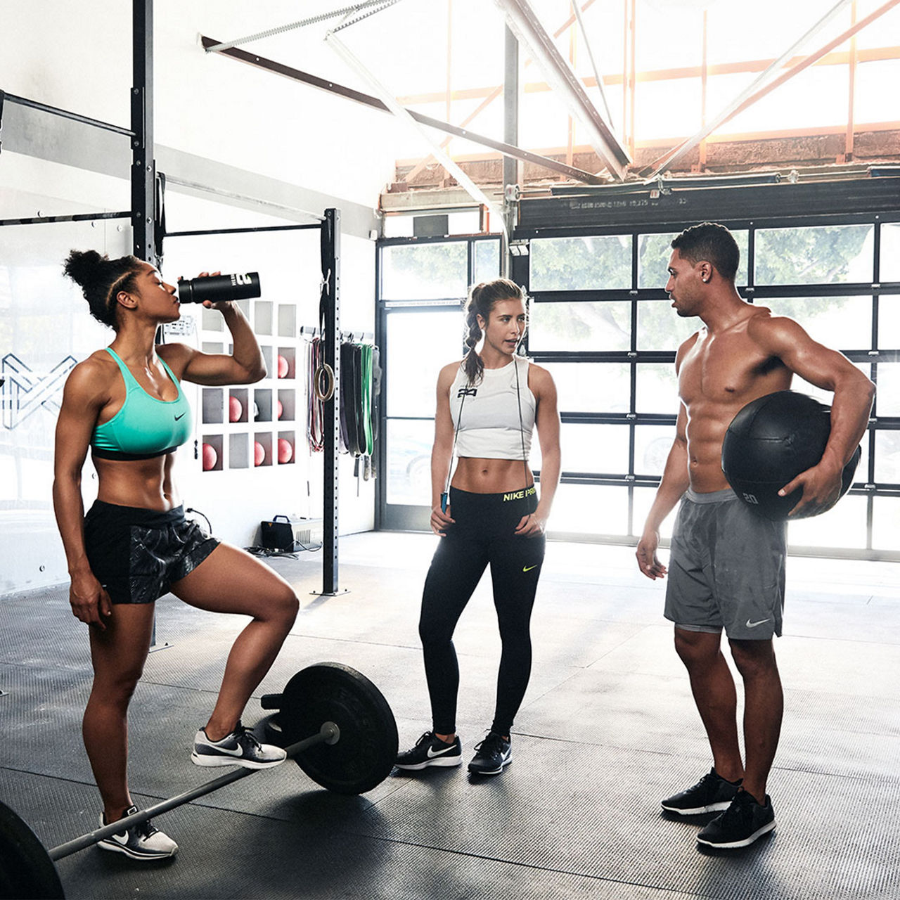 Group Of friends working out in the gym