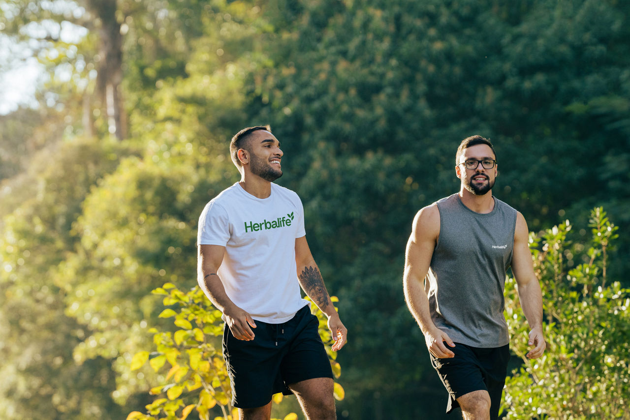 Athletic men walking in the park