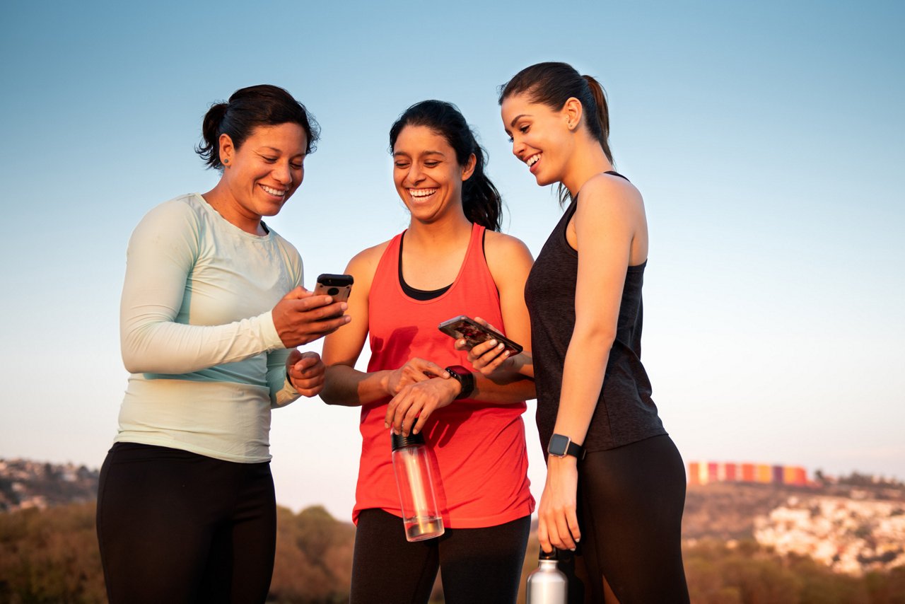 Women checking their phones