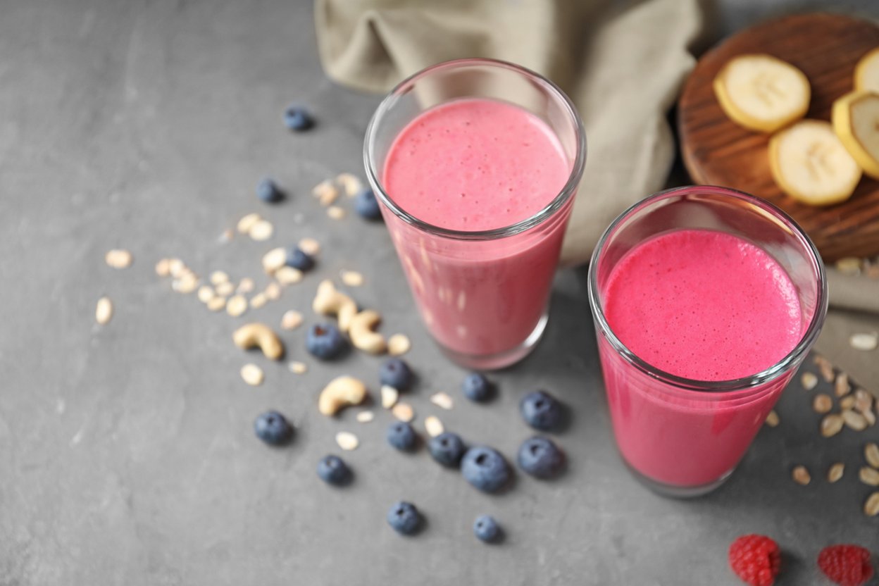 Smiling man sitting with F1 Shake