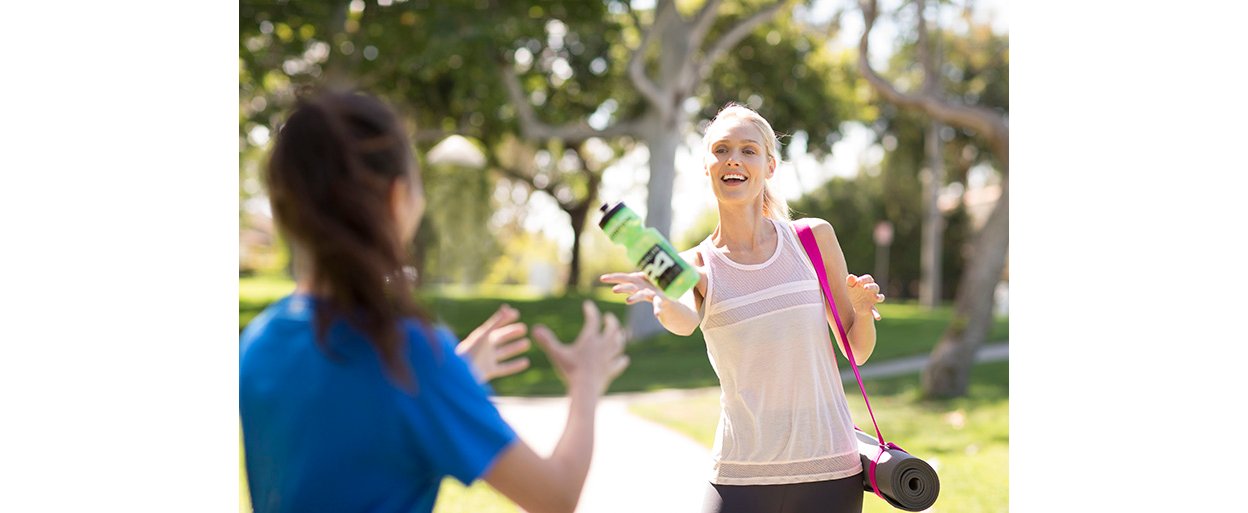 Global Lifestyle Shoot - Woman Passing H24 Water Bottle