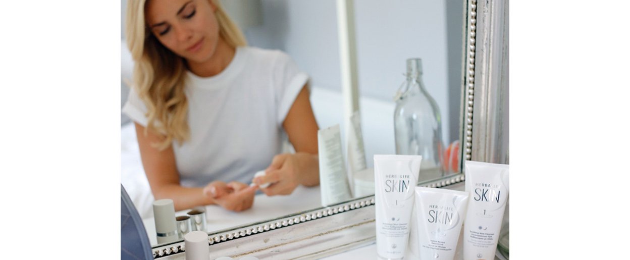 Woman Using Herbalife Skin Products