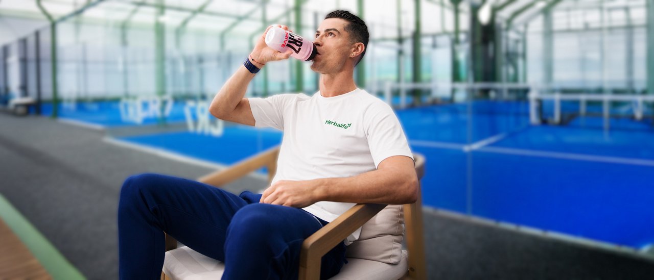 Cristiano Ronaldo drinking CR7