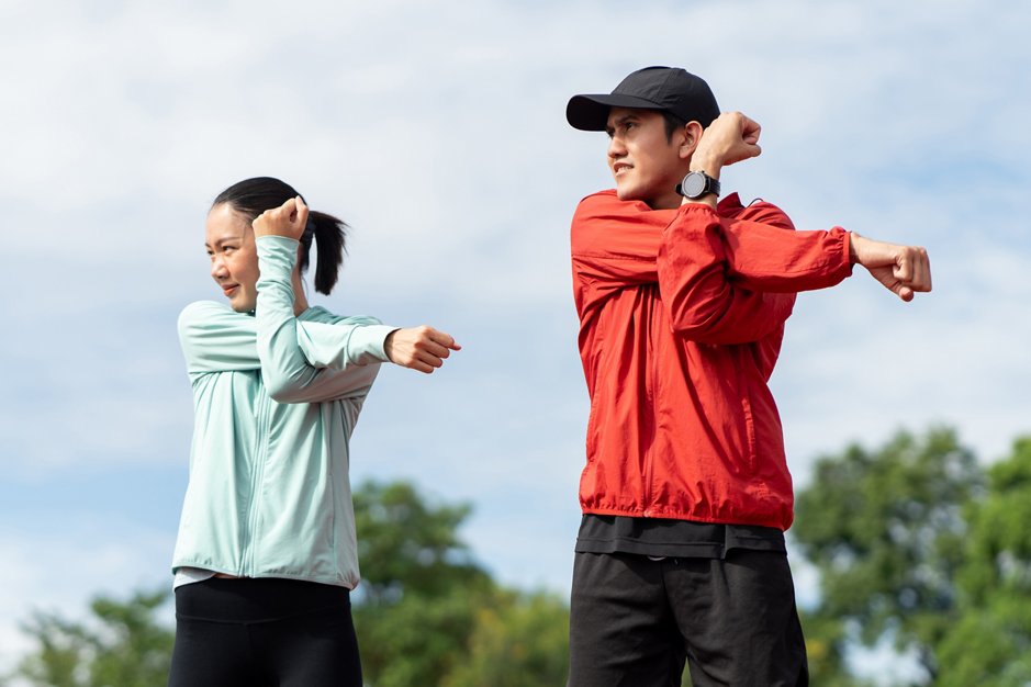 asian couple doing streching