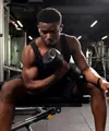 Man lifting weights at the gym