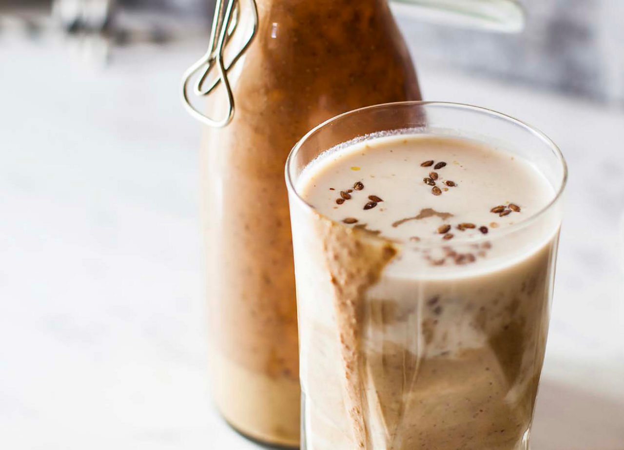 Bursting with your favorite coffee-shop flavors, this latte and peanut-flavored shake will be your new favorite snack to crush your cookie cravings.