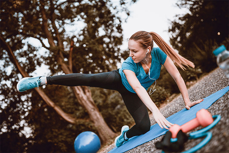 Image of woman exercising outdoors