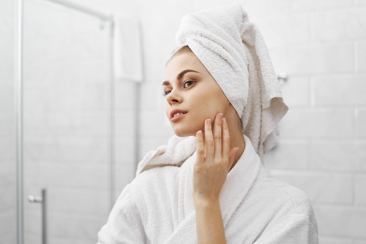 Woman checking skin