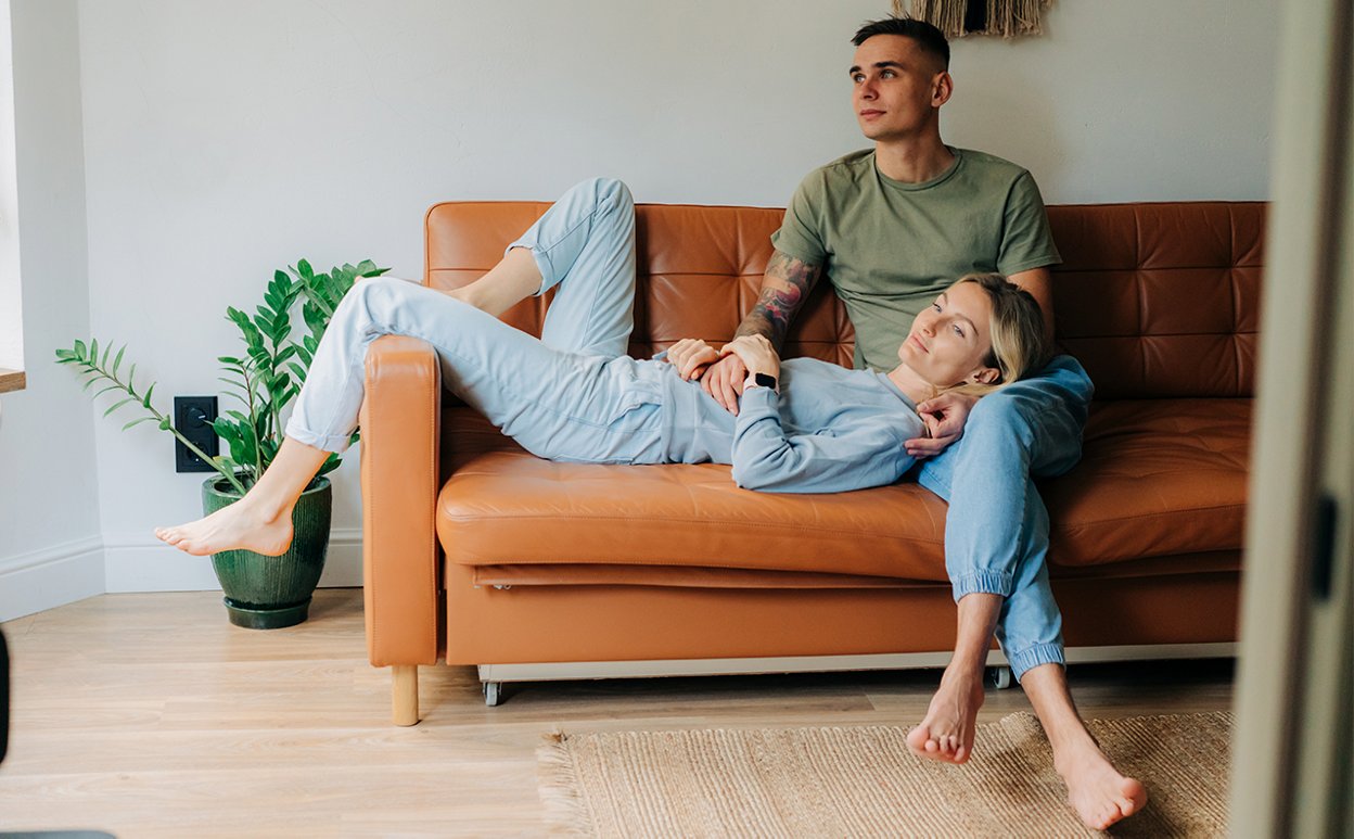 Couple seating on a couch