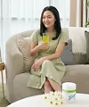 Woman Drinking Beauty Powder Drink