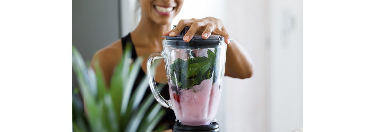 Woman making a shake