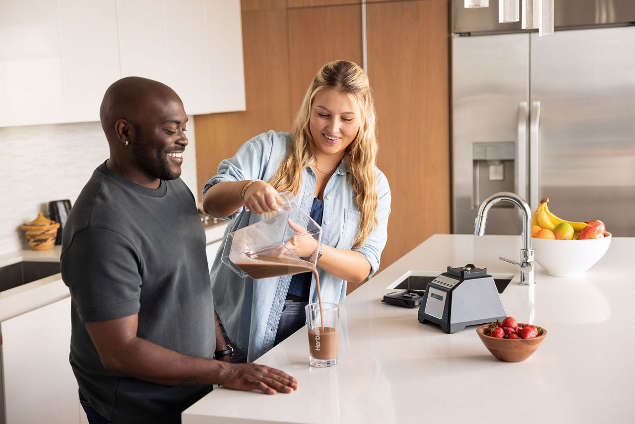 Man and woman healthy breakfast kitchen