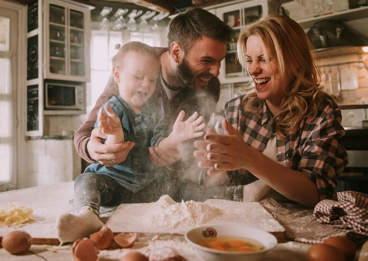 Family cooking and laughing together