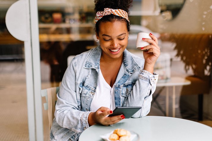 Woman tablet cafe