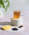 Bebida instantánea de extracto de té con plantas aromáticas