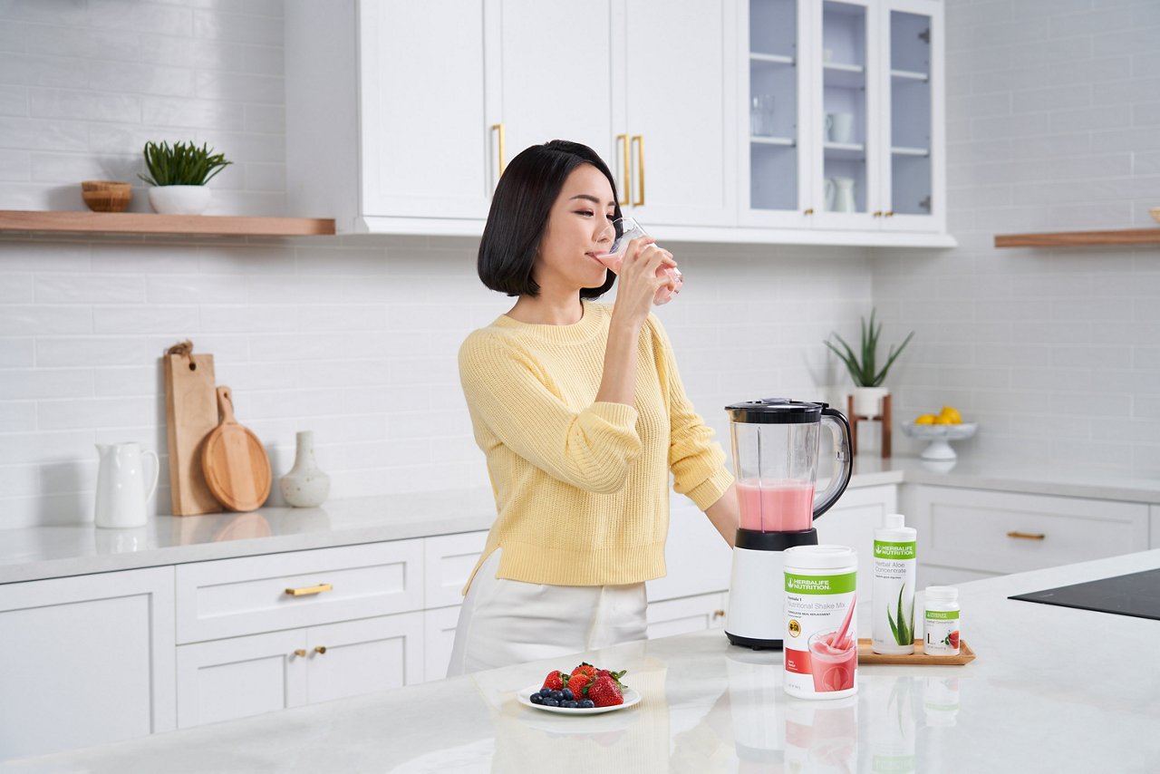 Asian woman preparing healthy breakfast