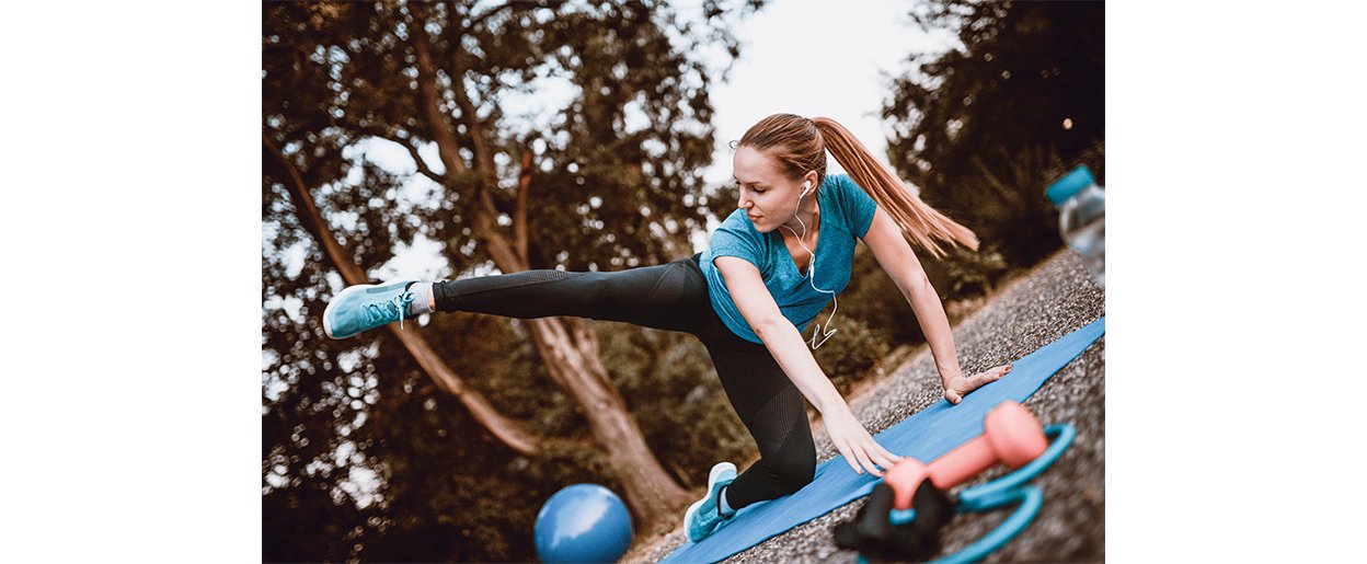 Image of woman exercising outdoors