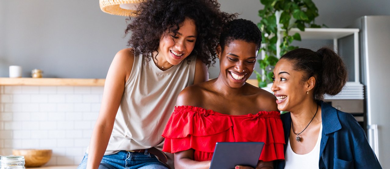 Happy beautiful hispanic south american and black women meeting indoors and having fun - Black adult females best friends spending time together, concepts about domestic life, leisure, friendship and togetherness