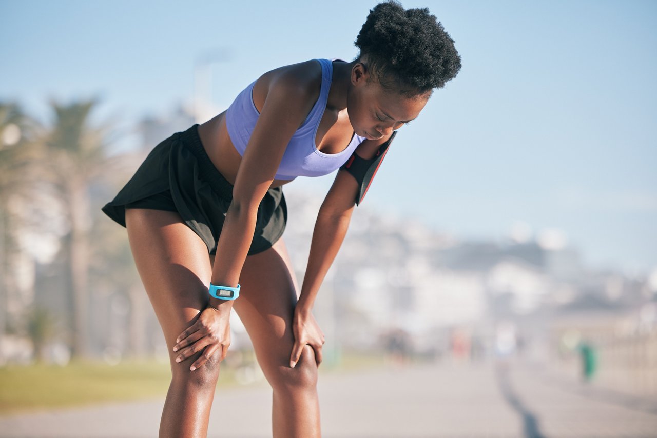 Woman taking a break on run