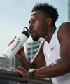 Man staying hydrated during run