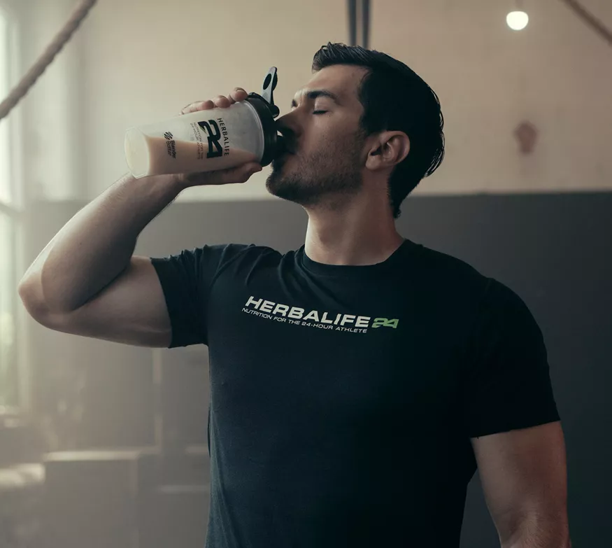 Man drinking protein shake after workout