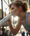 Woman staying hydrated during workout