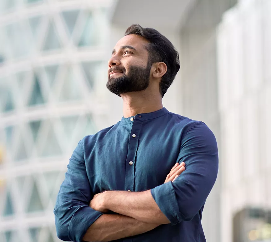 Confident man smiling outdoors